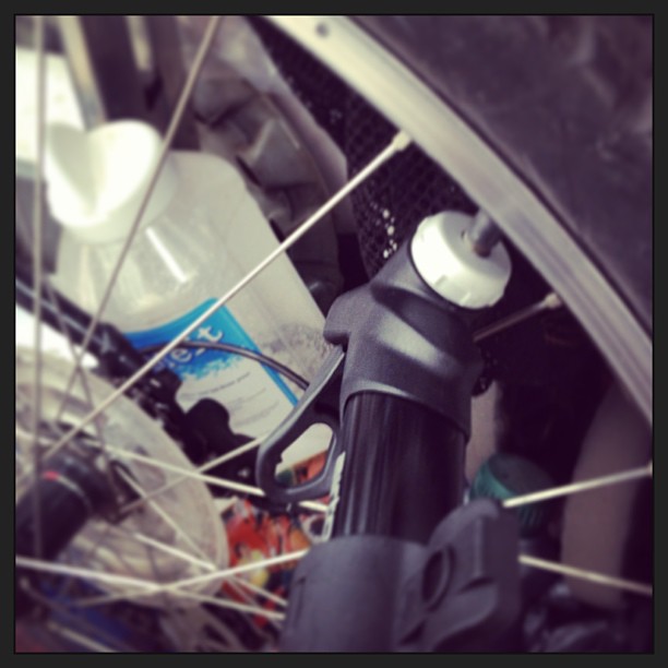 Daddy was doing things to his bike today. He sat me up in a chair so I could watch!